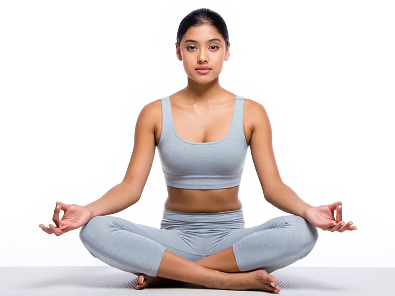 Mujer practicando yoga en casa